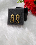 Boucles d'oreilles “Trombone”